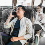 a guy enjoying his ride on bus